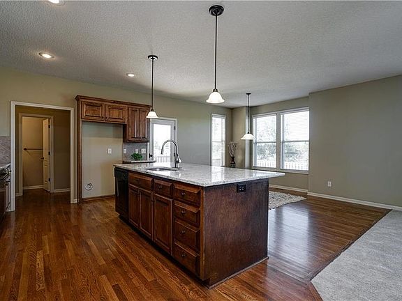 Well appointed kitchen with large island and granite counters!