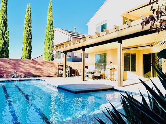 Solar Heated Pool with Covered patio and Gazebo for BBQ and entertaining.