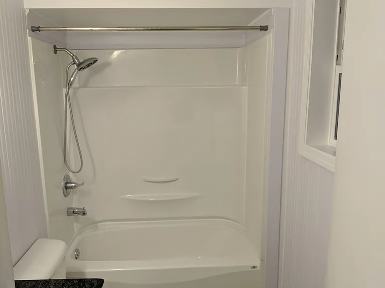 first floor bathroom with tub