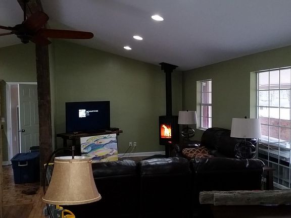 Greatroom with wood burning stove.