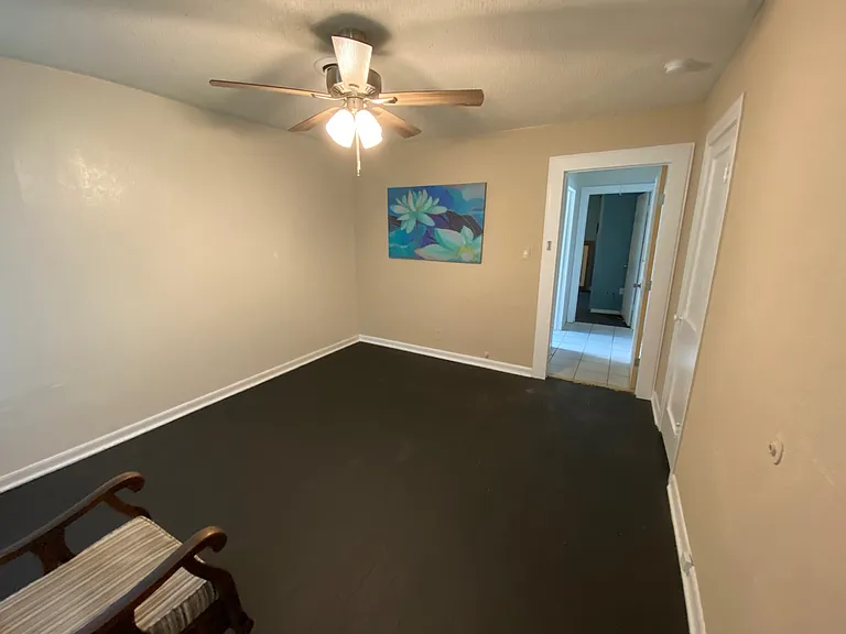 View from Master through hallway to second bedroom. (picture removed)