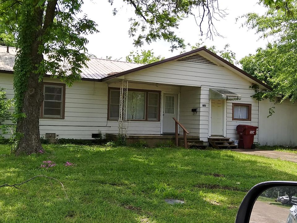 Shady yard in quiet neighborhood. Large fenced back yard