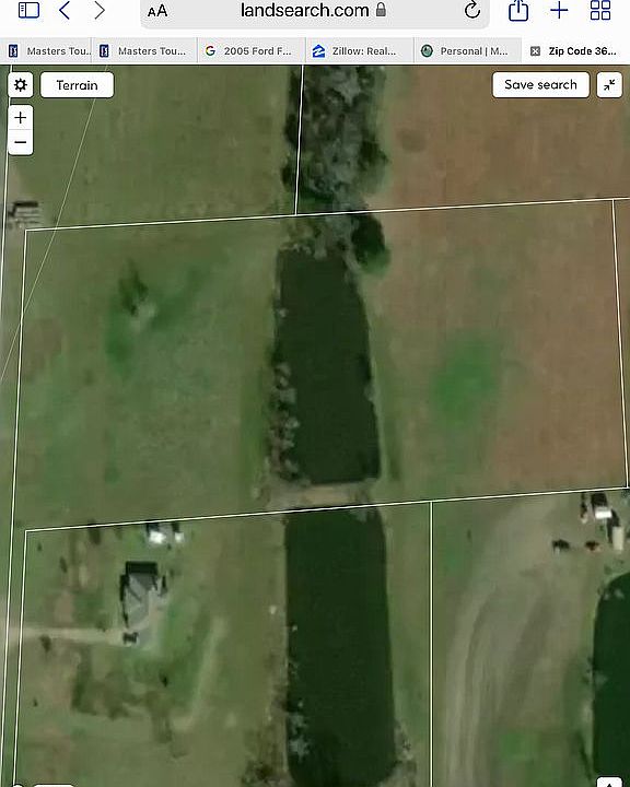 Lot on both side of pond