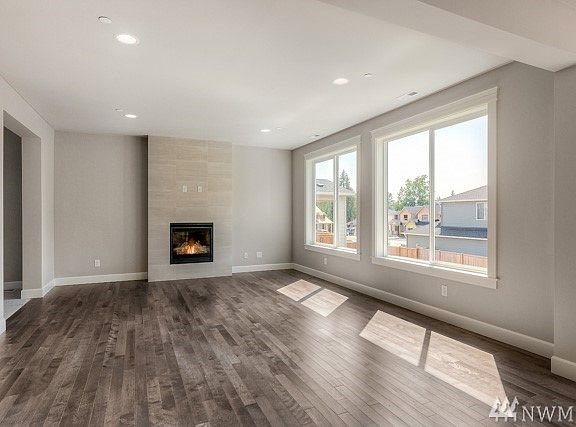 Hampton 4438 sf plan , elevation A ( Lot 8) is under construction, this photo is of another home and floorplan in a different community.  This photo is to be viewed as a sample of the different exterior colors, designs, details and finishes.