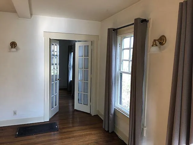 Bedroom 2 french doors entry from living room