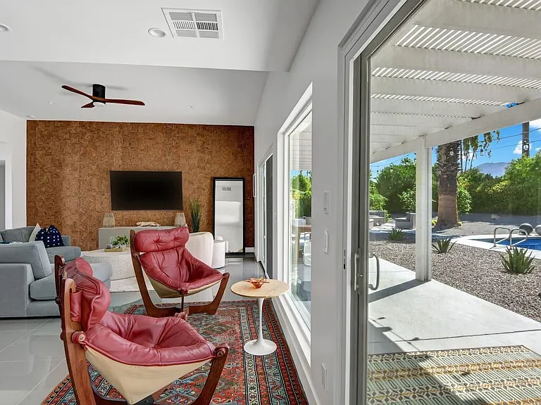 living room looking to pool view