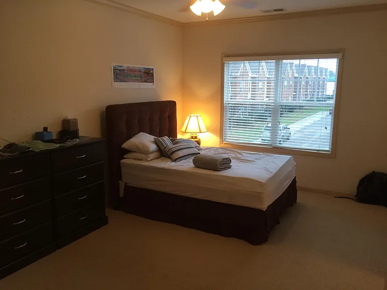 One of the 3 upstairs bedrooms. (former tenant furniture not included)
All bedrooms have wall to wall carpeting, closets and large windows.