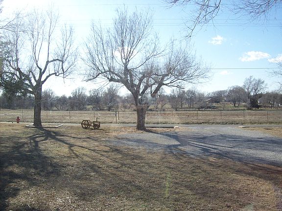 Out the large front window.