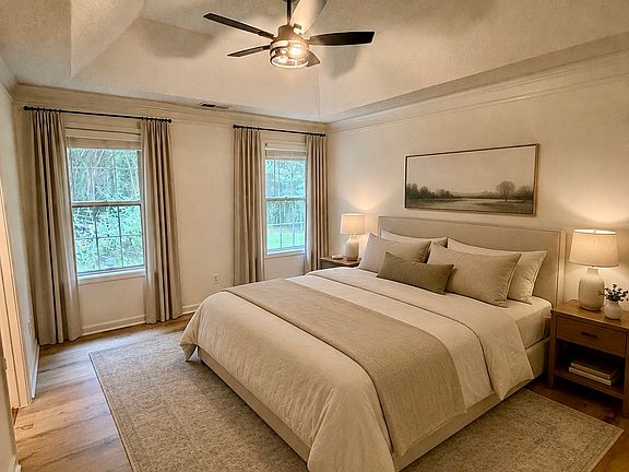 VIRTUALLY STAGED
Primary bedroom with trey ceiling and ceiling fan