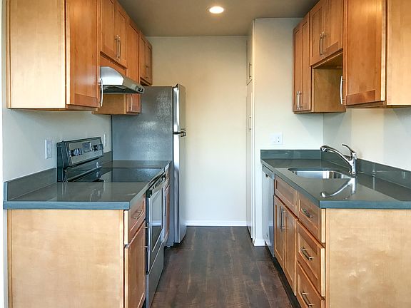 New Kitchen with Quartz countertops and Stainless appliances.