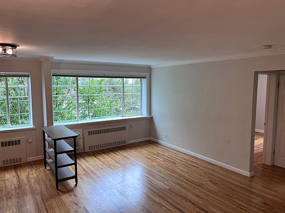 open living room with mountain/downtown views