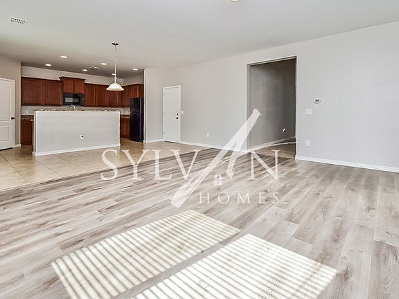 2nd image of 8267 W Kittiwake Ln