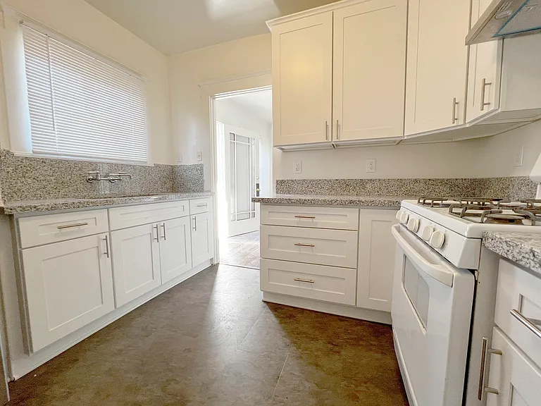 Kitchen - refrigerator & stove included