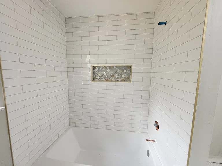 NEW CLASSY TUB AWAITING BRASS FIXTURES, LAUNDRY HOOKUPS