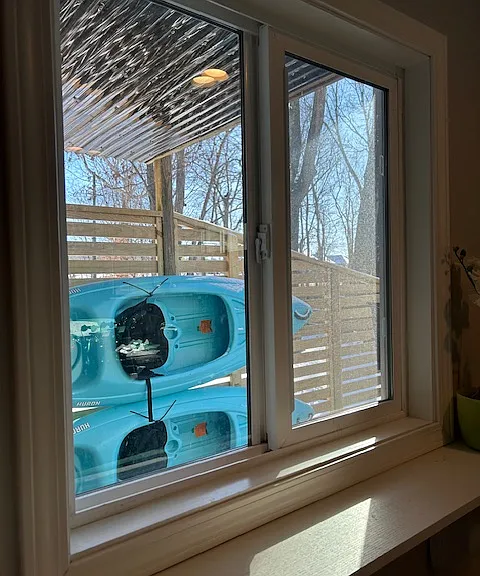 view of kayaks from pass thru window