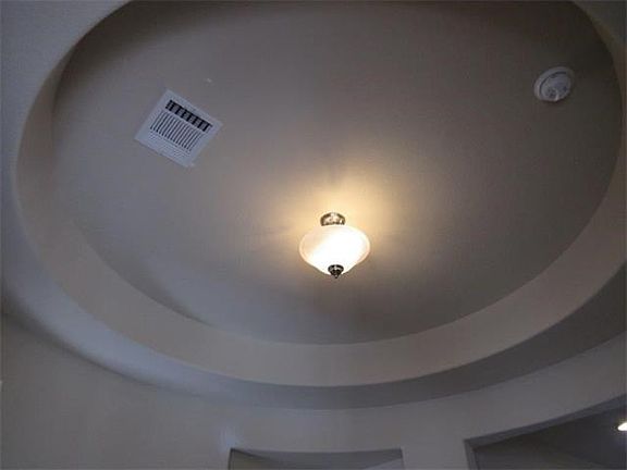 Circular rotunda entryway says elegance as soon as you enter the home.