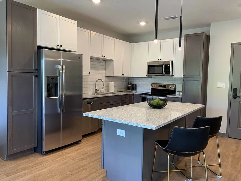 Our kitchens offer a functional design with ample cabinetry and counter space, making meal prep and organization effortless.