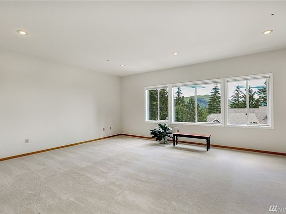 Formal Living Room w/ View of Squak Mountain and Mt. Rainier;  Lots of Room for a Grand Piano and Much More!