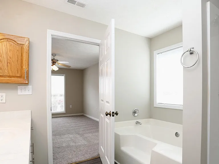 Relax inside your spacious bathroom at Karen Lake