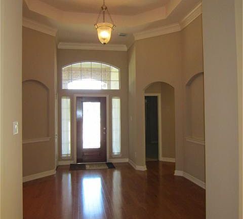Beautiful rotunda foyer with picture niches.