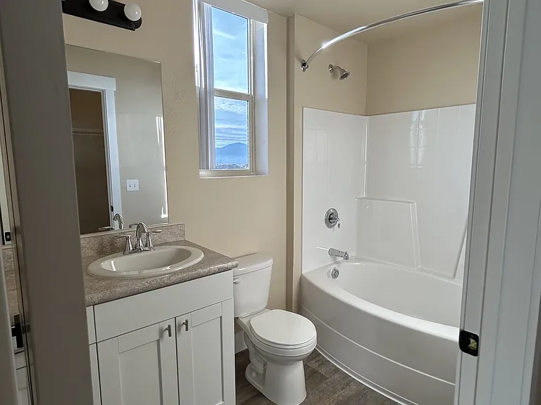 986 SQ. FT.
2 bed 2 bath
Bathroom inside master closet
