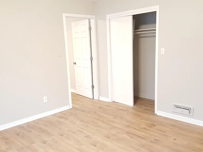 View of one of the closets in master bedroom