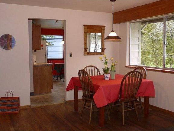 Dining room adjoiuns the kitchen