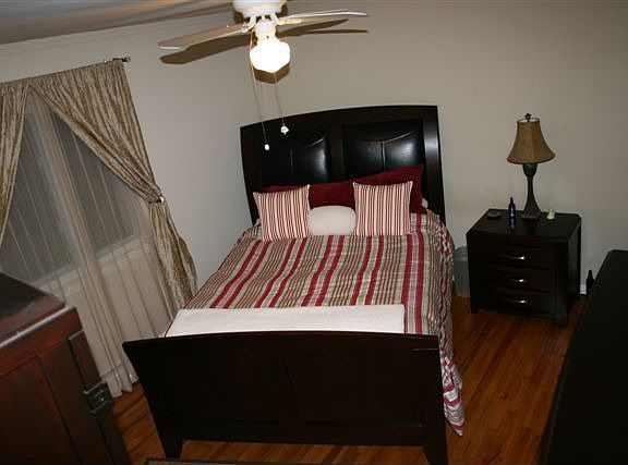 MASTER BEDROOM,HUGE WALK IN CLOSET,&HARDWOOD FLOORING.