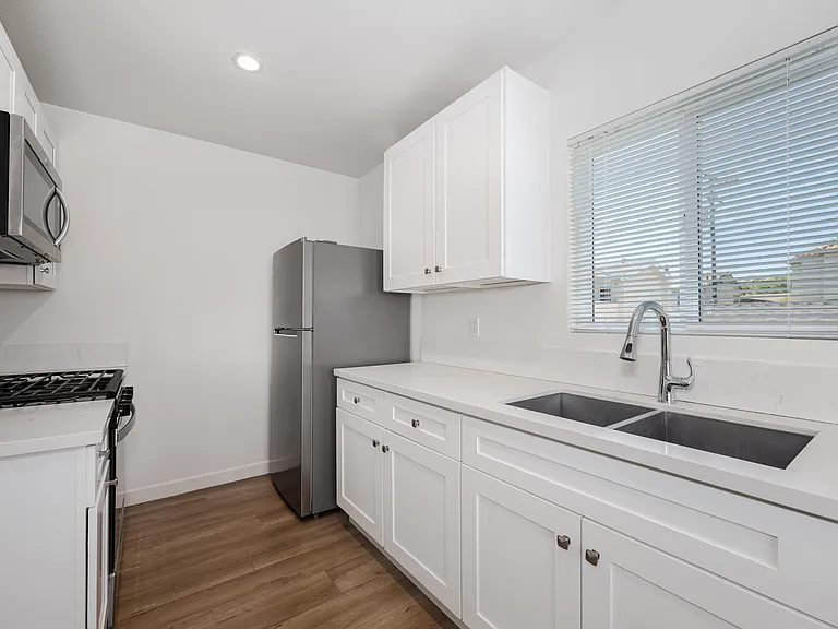 Kitchen Area (Refrigerator, Oven/Stove, Microwave)