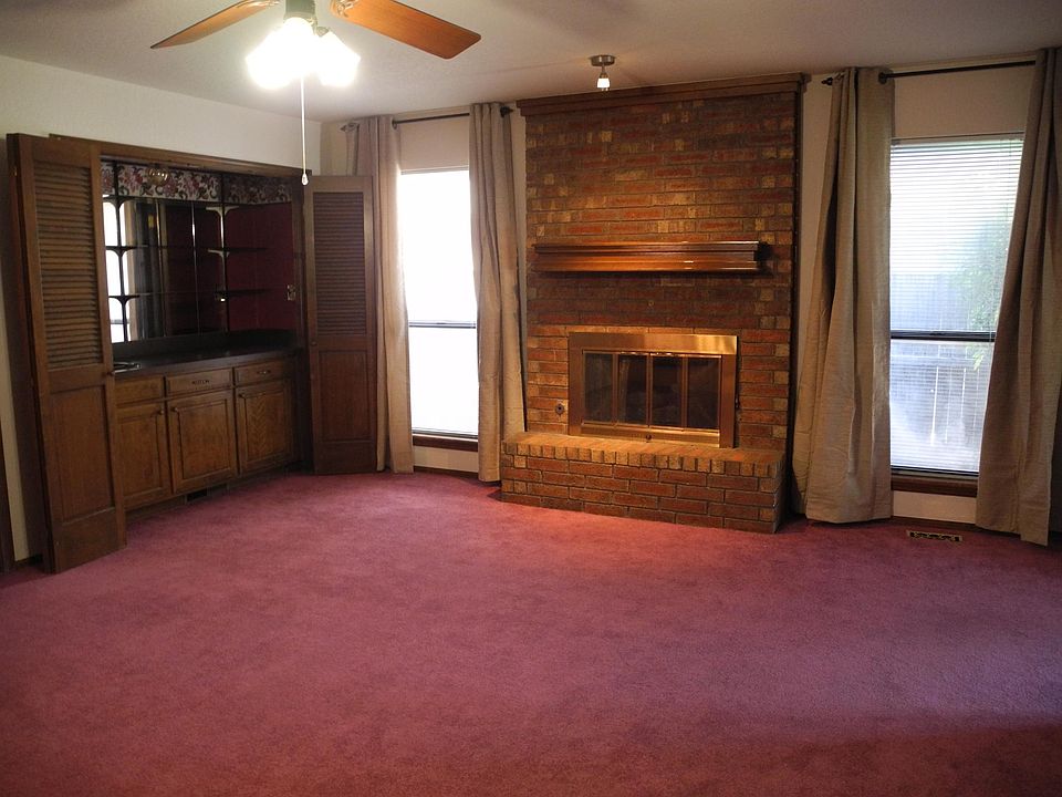 Front room, carpet has been replaced with wood flooring.