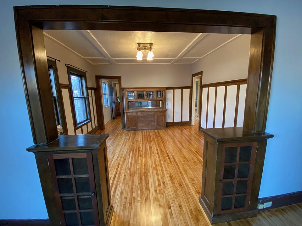 Craftsman charm and original woodwork with built-ins and gorgeous hardwood floors.