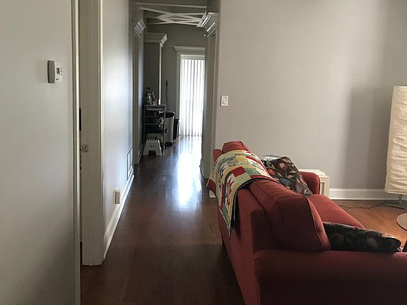 Hallway to kitchen from open space area