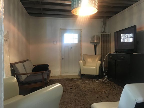Exposed Ceiling with Heat Resistant Insulation; living room