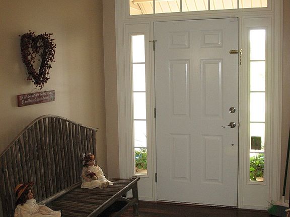 Foyer features 3 coat closets