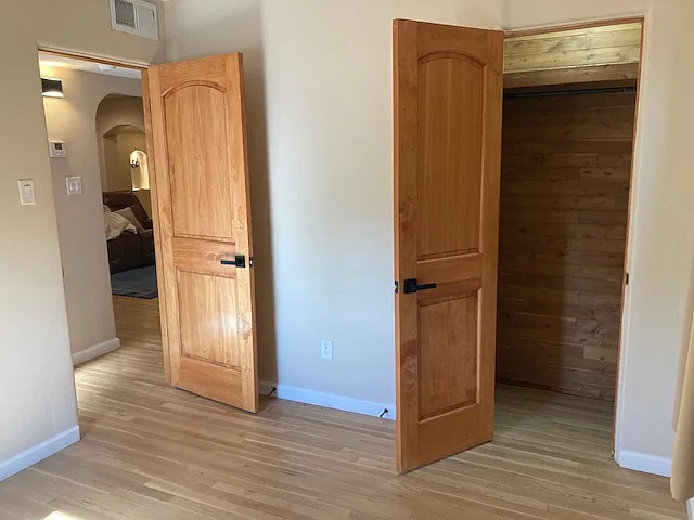 View from BR 2 with Hardwood and lighted cedar closets