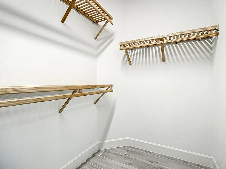 primary bedroom walk-in closet