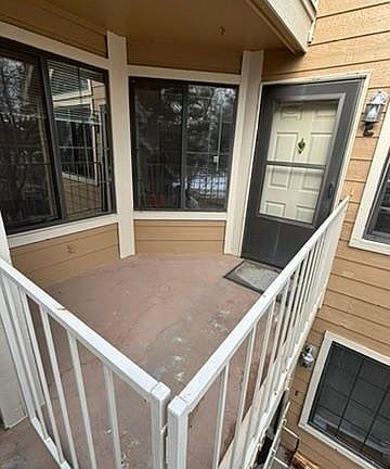 Front door with private deck space...perfect for a table and a couple of chairs