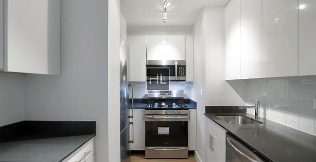 2nd image of 226 E 27th St APT 3C
