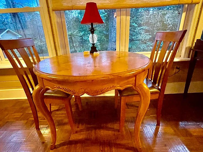 Eat breakfast, play cards and relax in the sunroom.