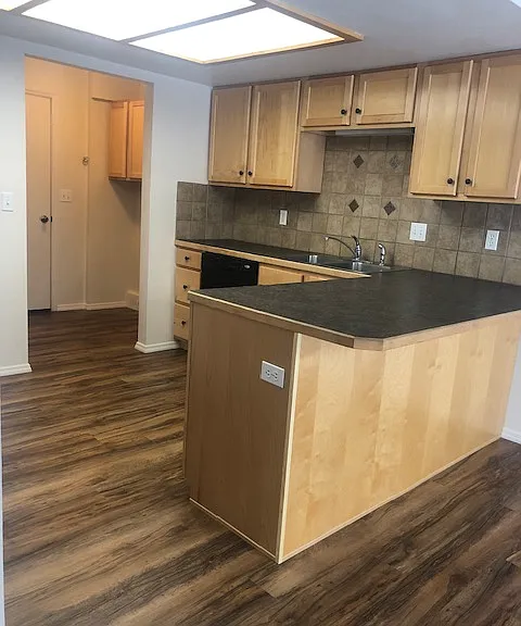 Rental unit has tile floors in the Laundry, Kitchen, and Dining Rm