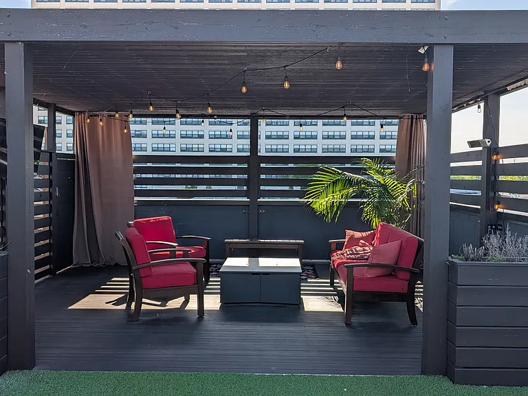 Pergola with fire pit and outdoor TV during warm months