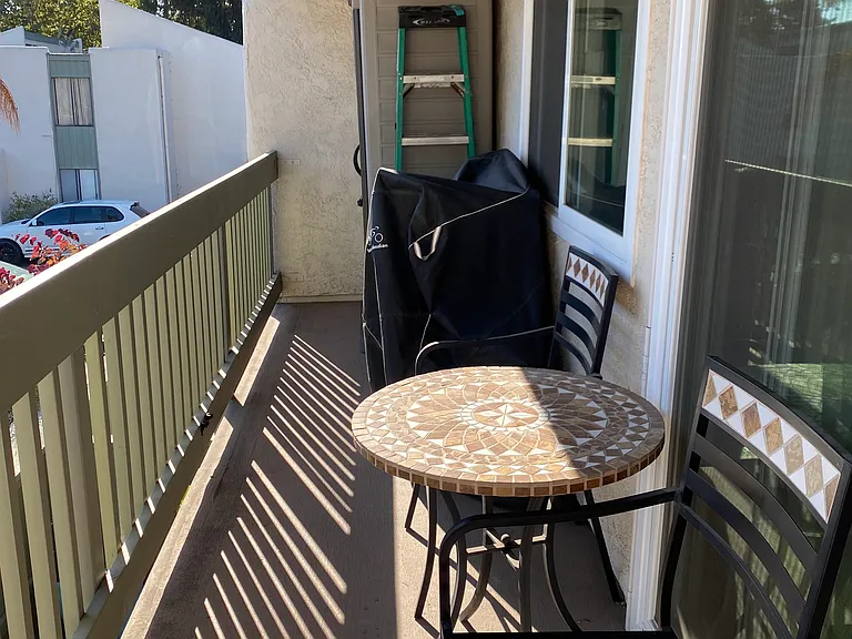 Bright patio with sun shades and lighting