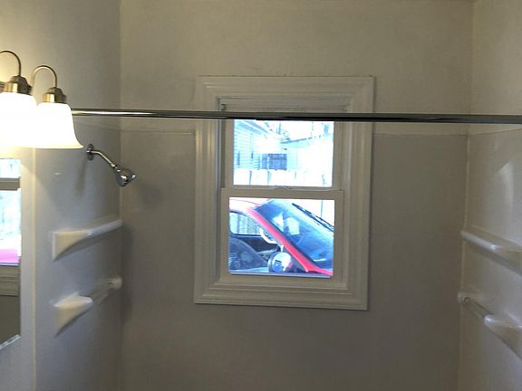 Bathroom.  All new tub, surround, commode, sink/cabinet, med