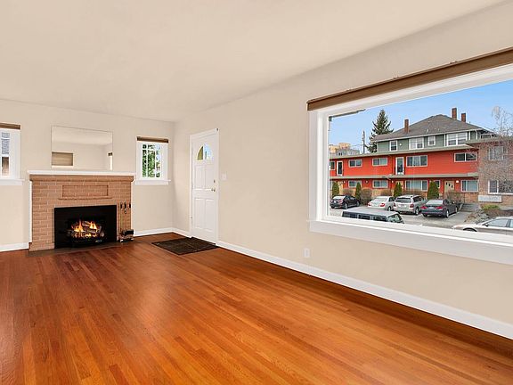 Warm & inviting living room with wood stove