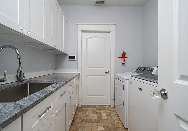 washer and dryer - door leads to the rec-area (the garage was converted)