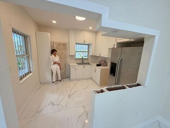 4th image of 6410 NW Miami Ct