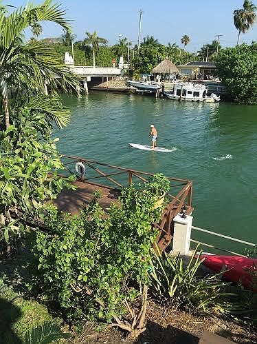 view of paddle boarders