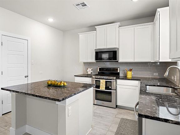 Chef's kitchen with stainless steel appliances (New Fridge to be installed)