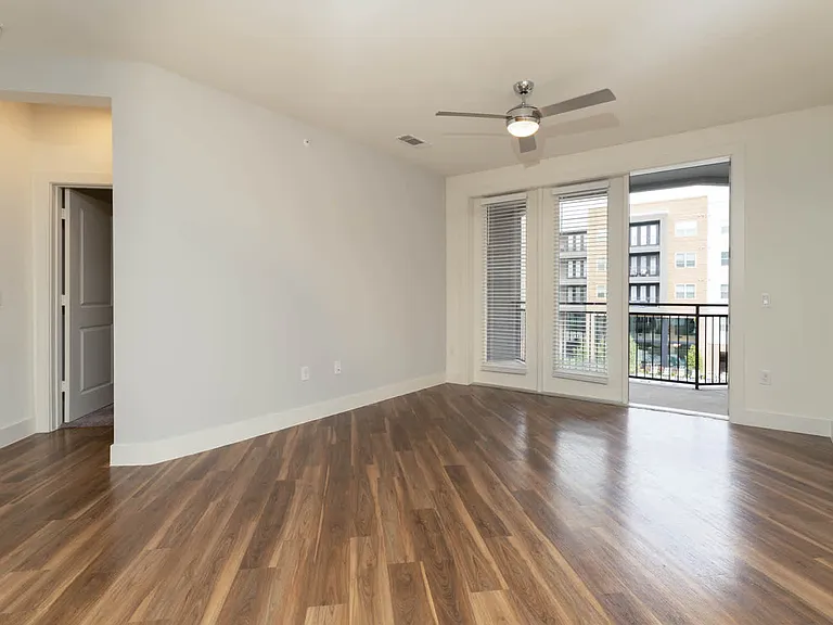 Living Room with Balcony and Hard Surface Flooring