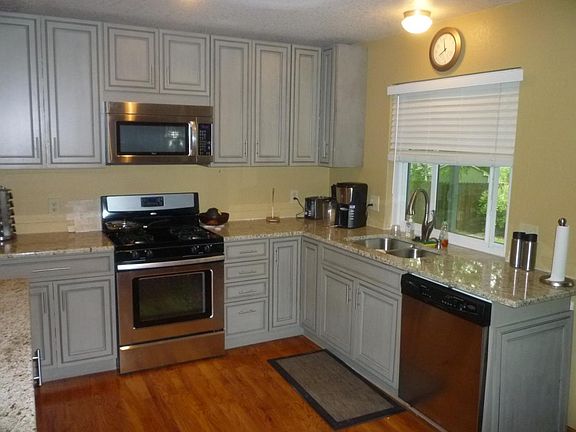 Hardwood floors in kitchen/entry and living room